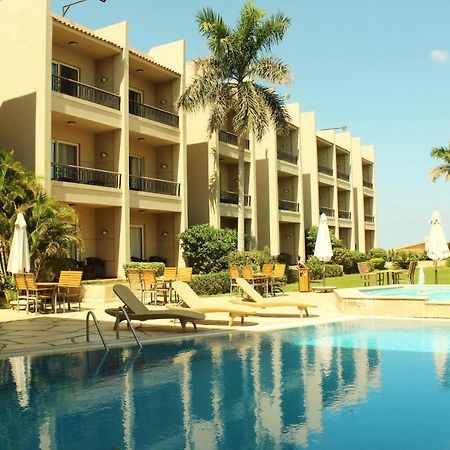 Panacea Suites Hotel Borg El Arab Exterior photo